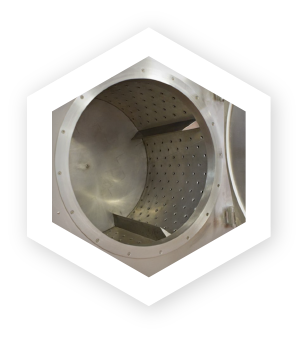 Inside the drum of an open tumble chiller not in use