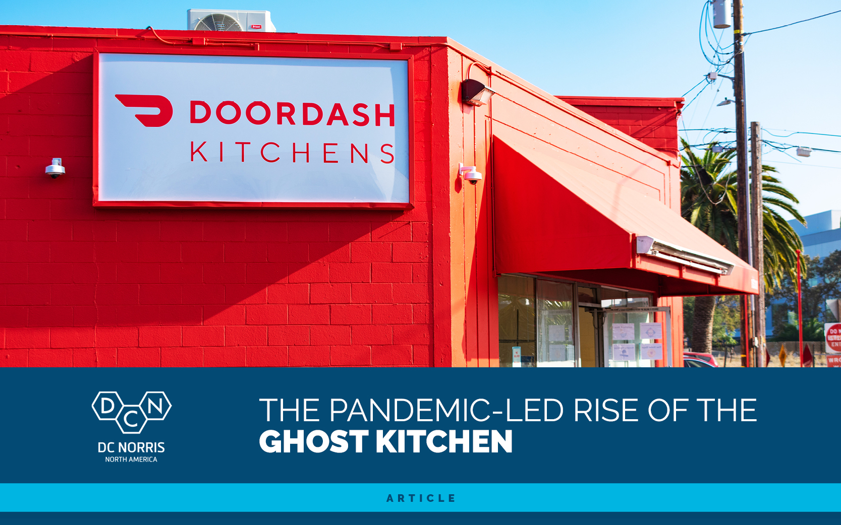 a bright orange building with a sign on the side reading 'Doordash Kitchens' with the DC Norris article title 'The Pandemic-Led Rise of the Ghost Kitchen'