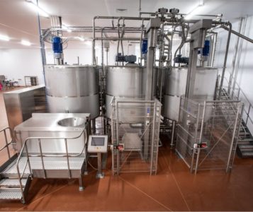 a photograph of DC Norris North America's wet pet food manufacturing equipment setup on the factory floor