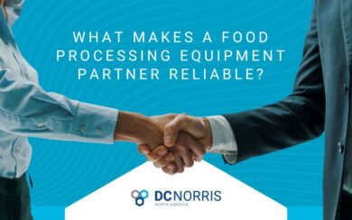 an image of a professional handshake between two people is just above a white diamond shape with the dc norris north america logo. Above the handshake is a headline that reads "What makes a food processing equipment partner reliable?"