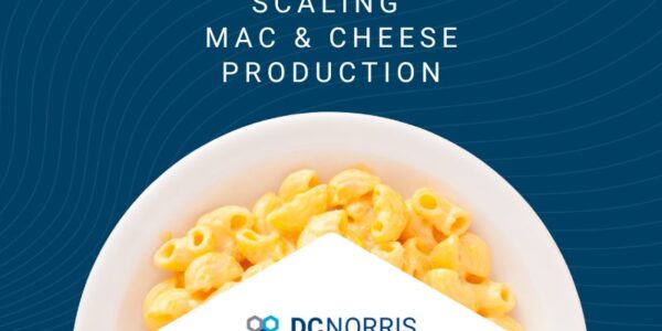a large white bowl filled with macaroni and cheese is just below a headline that reads "scaling mac and cheese production"