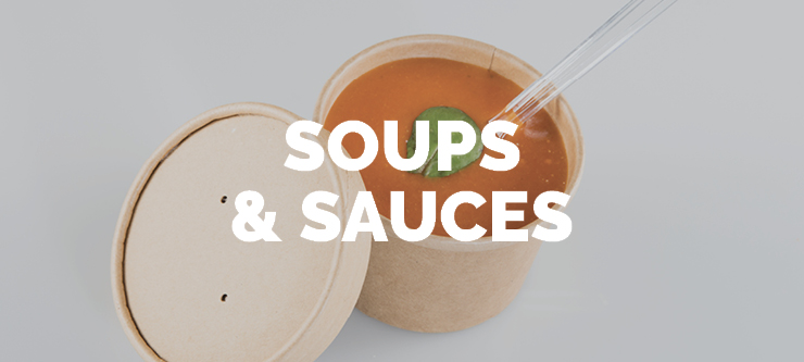 tomato basil soup in a takeaway container with a clear plastic spoon showcasing the type of prepared soups that DC Norris Equipment can manufacture
